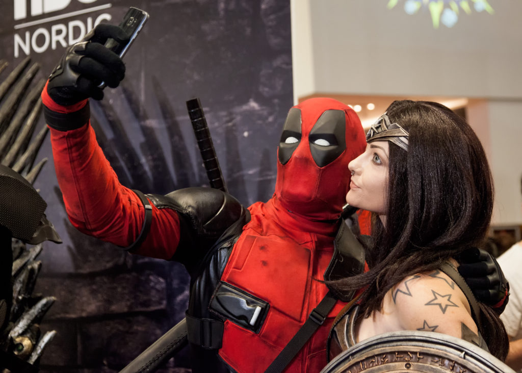 Who wouldn't want a selfie with Wonder Woman? Deadpool took his shot...